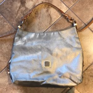 Platinum colored Dooney & Bourke shoulder bag